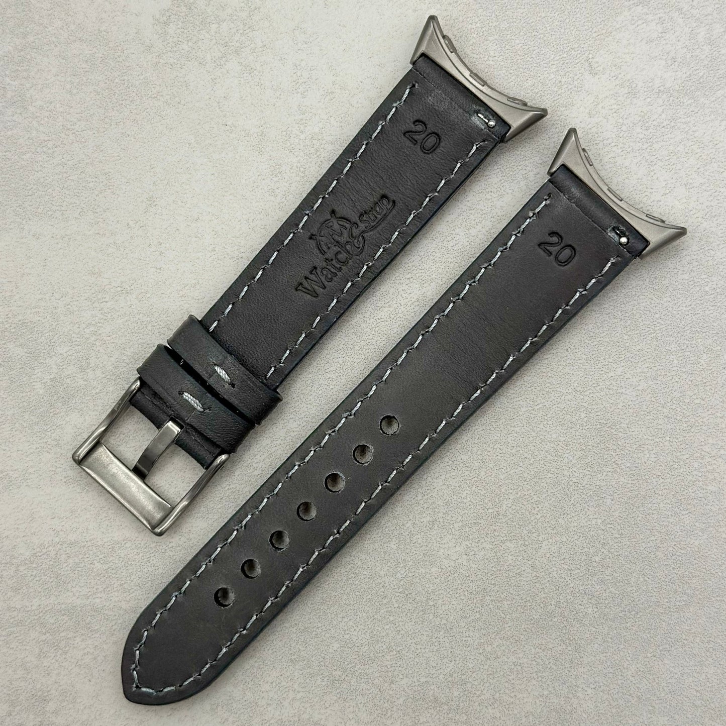 Rear of the Athens slate grey Google Pixel Watch strap. Watch And Strap logo.