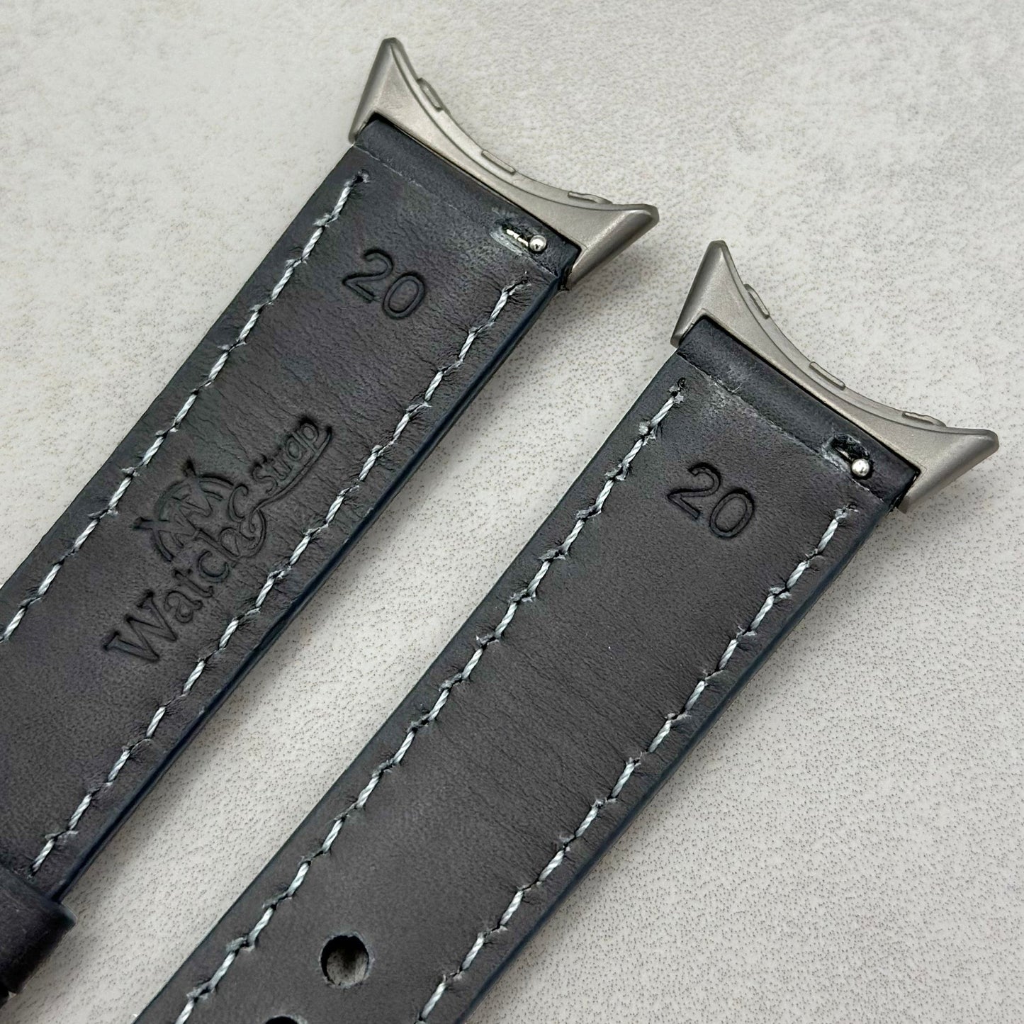 Rear of the Athens slate grey Google Pixel Watch strap. Watch And Strap logo.