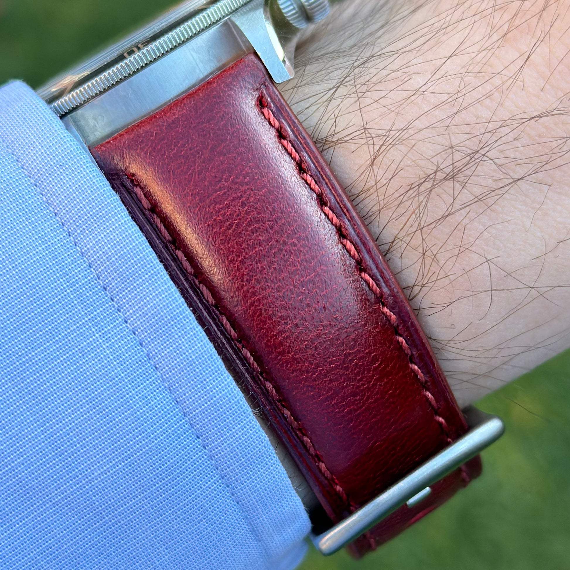 Wrist shot of the wine red vegetable tanned leather watch strap on the Tudor Blackbay 58. Watch And Strap