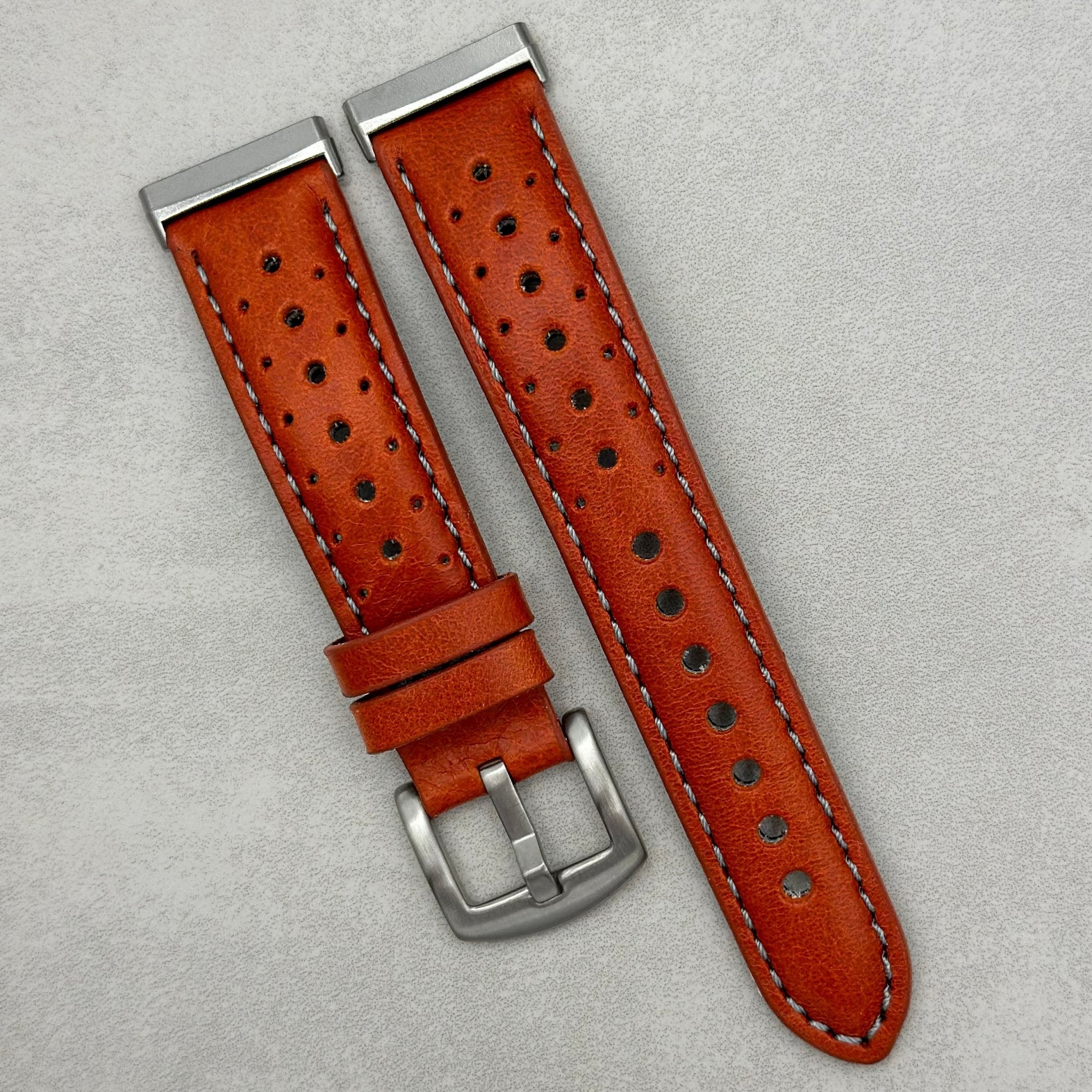 The Monte Carlo Orange Perforated Leather Fitbit Sense Versa Watch Strap watchandstrapco