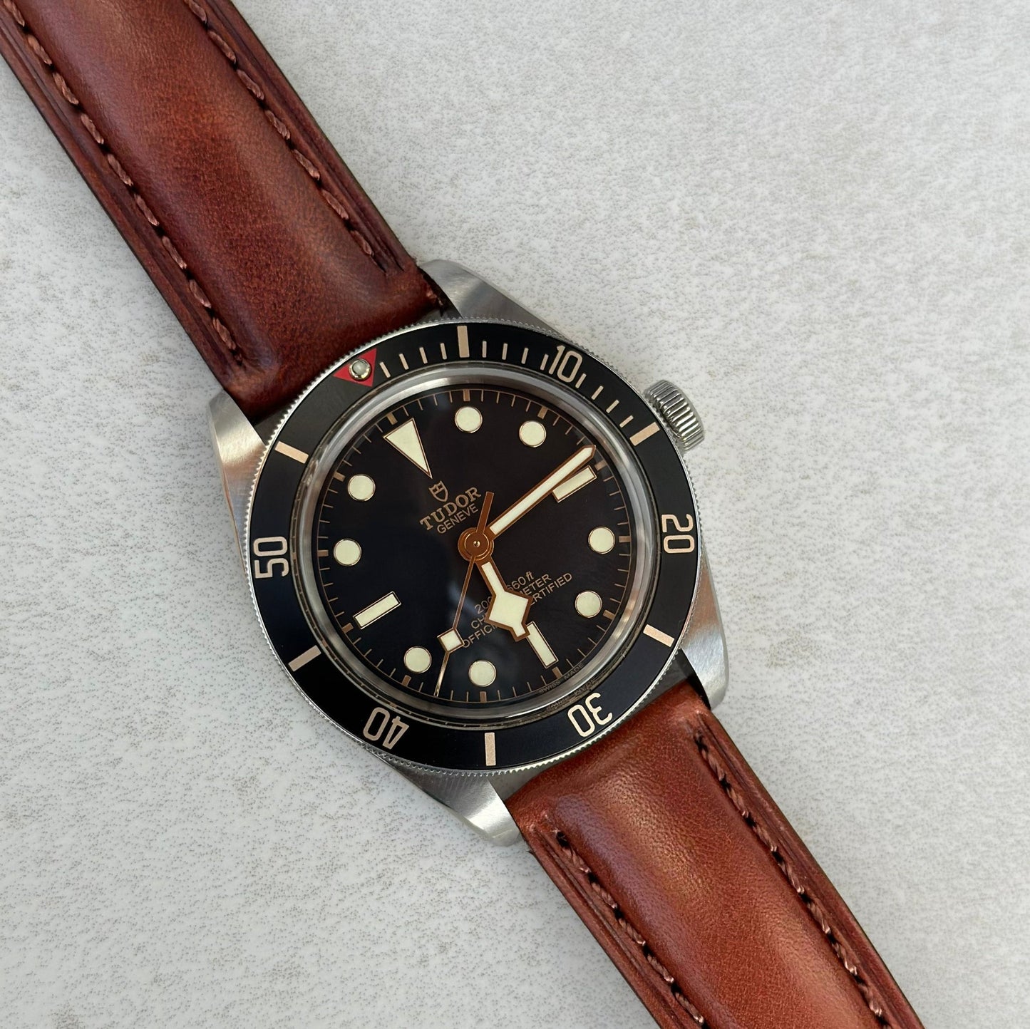 Chestnut brown full grain leather watch strap on the Tudor Blackbay 58. Padded leather watch strap. Watch And Strap