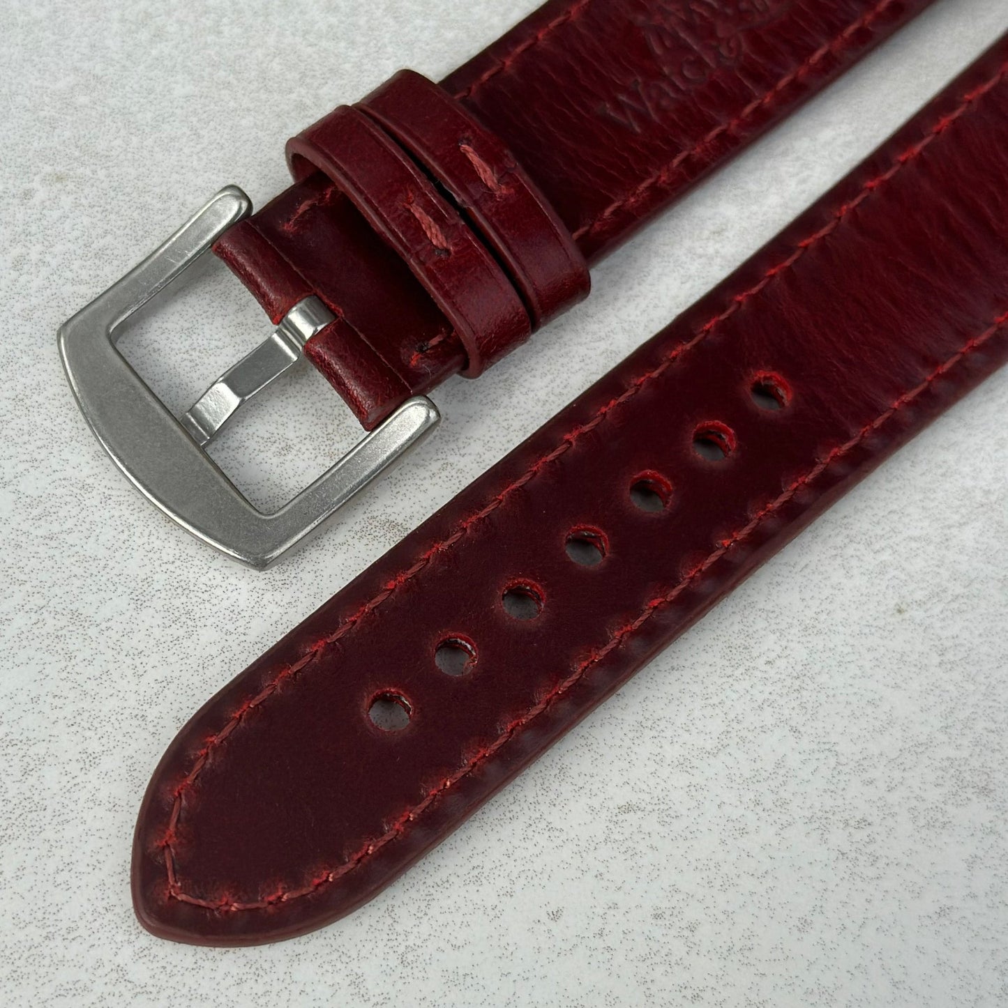 Underside buckle of the Athens wine red full grain leather watch strap.