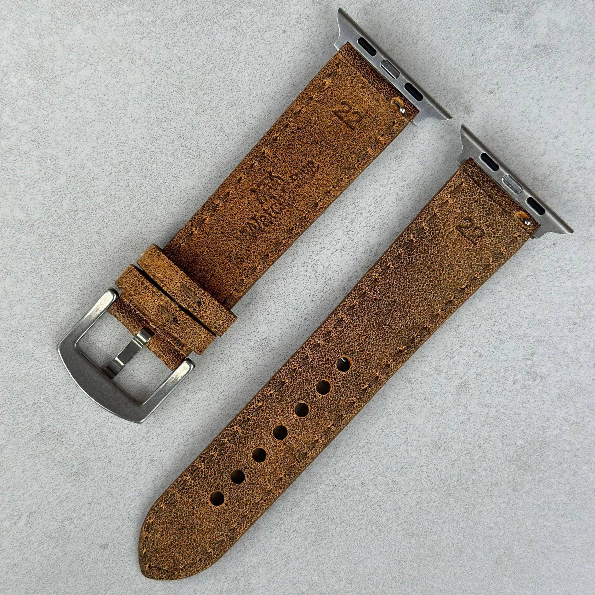 Rear of the Athens Desert Sand full grain leather Apple watch strap. Watch And Strap logo, 316L stainless steel buckle.