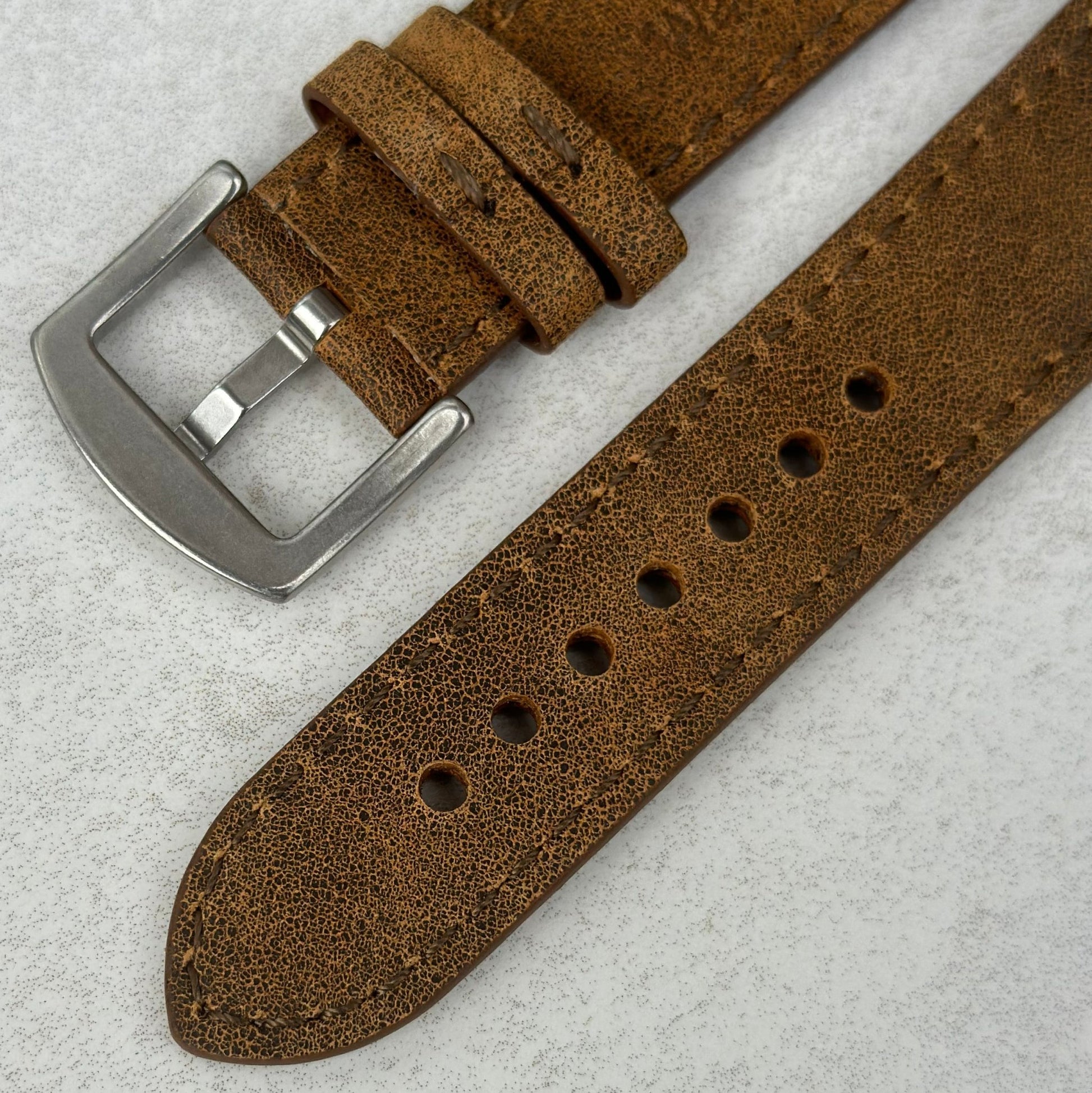 Underside of the brushed 316L stainless steel buckle on the Athens desert sand full grain leather watch strap.