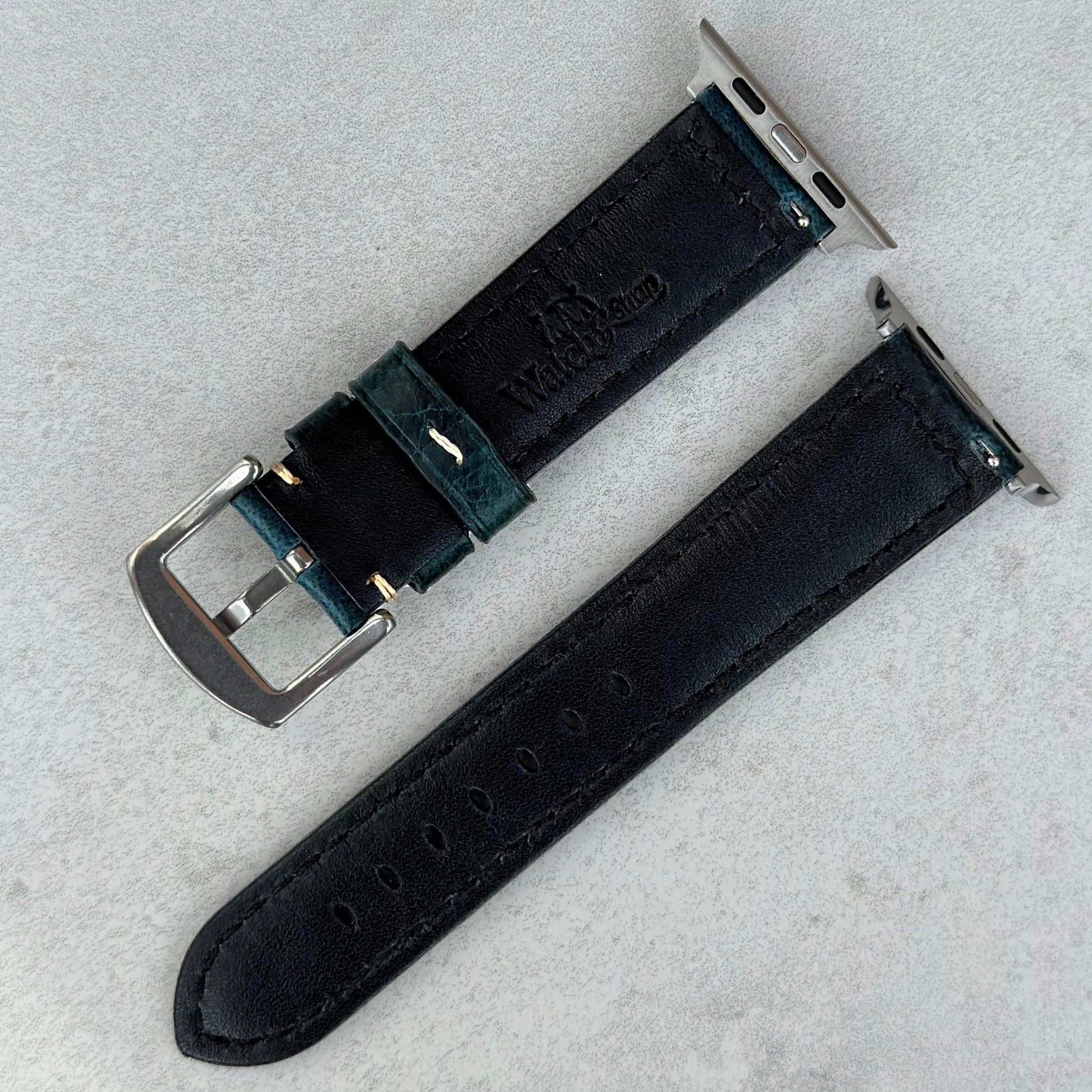 Rear of the Berlin blue full grain leather Apple Watch strap. Watch And Strap logo.