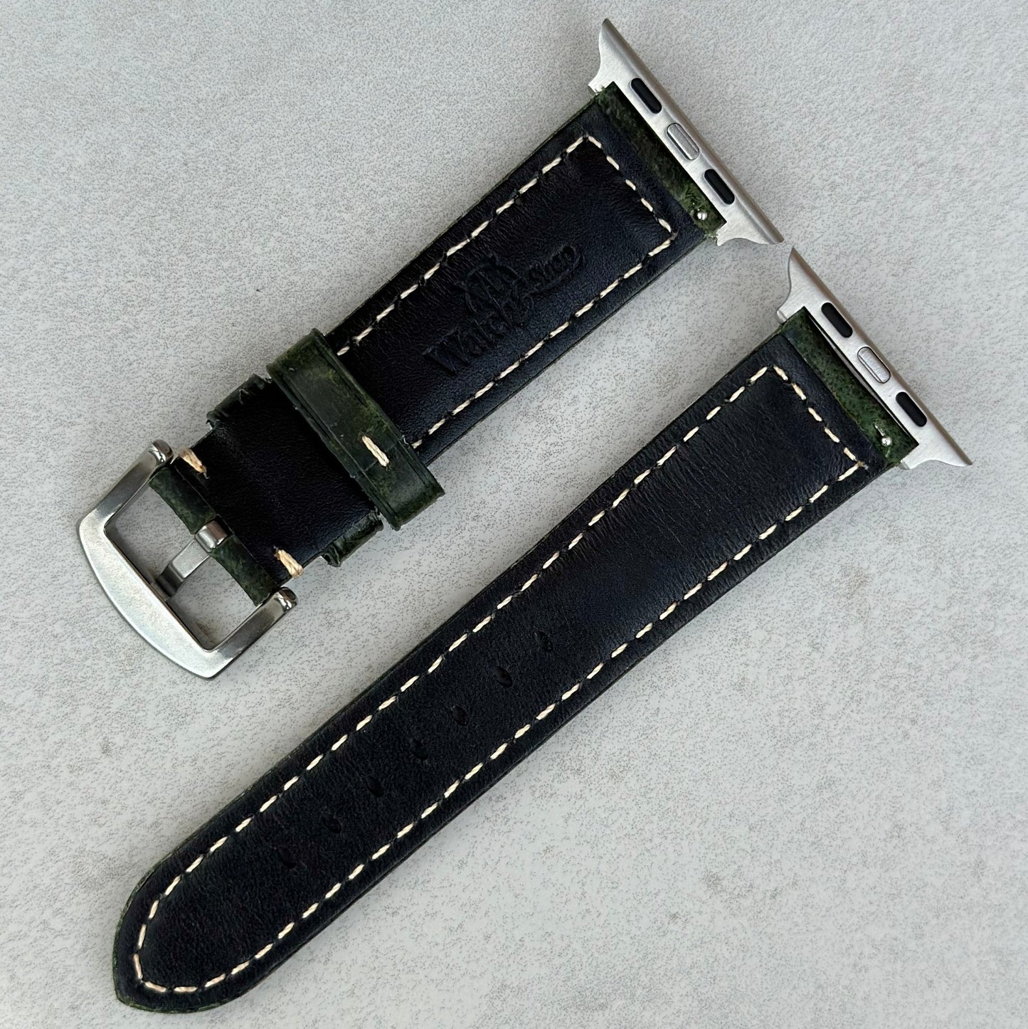 Rear of the Berlin green full grain leather Apple Watch strap. Watch And Strap logo.