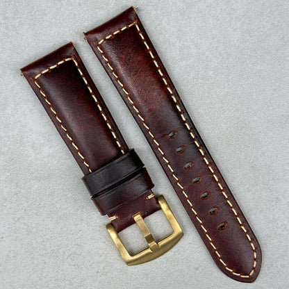 Berlin tabaco brown full grain leather watch strap with brushed gold buckle and contrast ivory stitching.