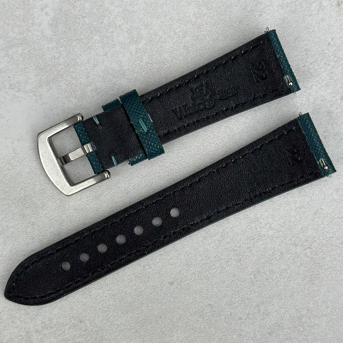 Rear of the Florence Saffiano leather watch strap. Watch and Strap logo. Quick release pins.