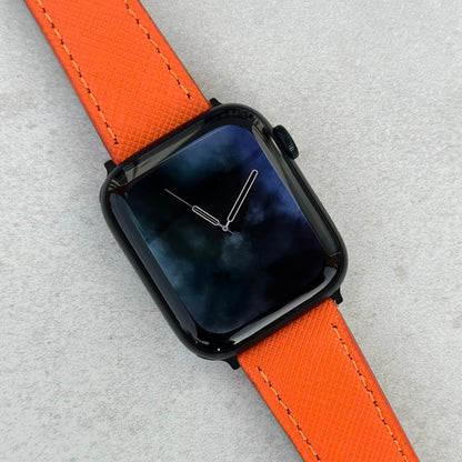 Florence orange Saffiano leather Apple Watch Strap on the Apple Watch series 9. Watch And Strap.