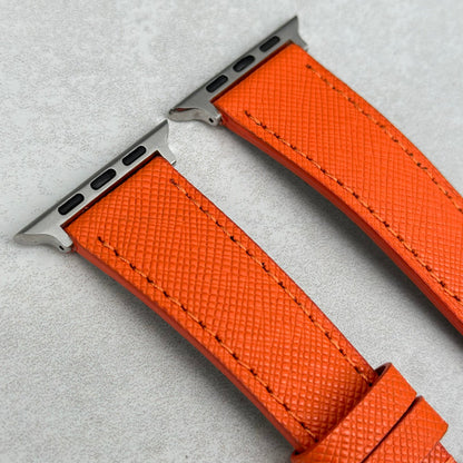 Top of the Florence Saffron orange saffiano leather Apple Watch Strap. 316L stainless steel hardware. Watch And Strap