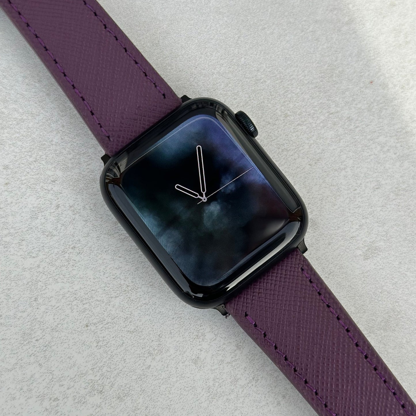 Florence Royal Purple Saffiano leather Apple Watch strap on the Apple Watch Series 9. Watch And Strap.