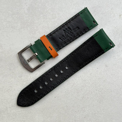 Rear of the Le Mans green and orange full grain leather racing watch strap. Watch And Strap logo and quick release pins.