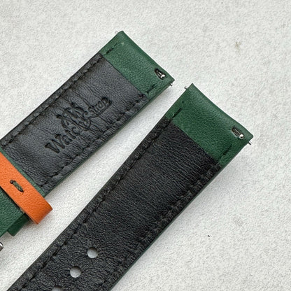 Quick release pins on the Le Mans green and orange full grain leather watch strap.