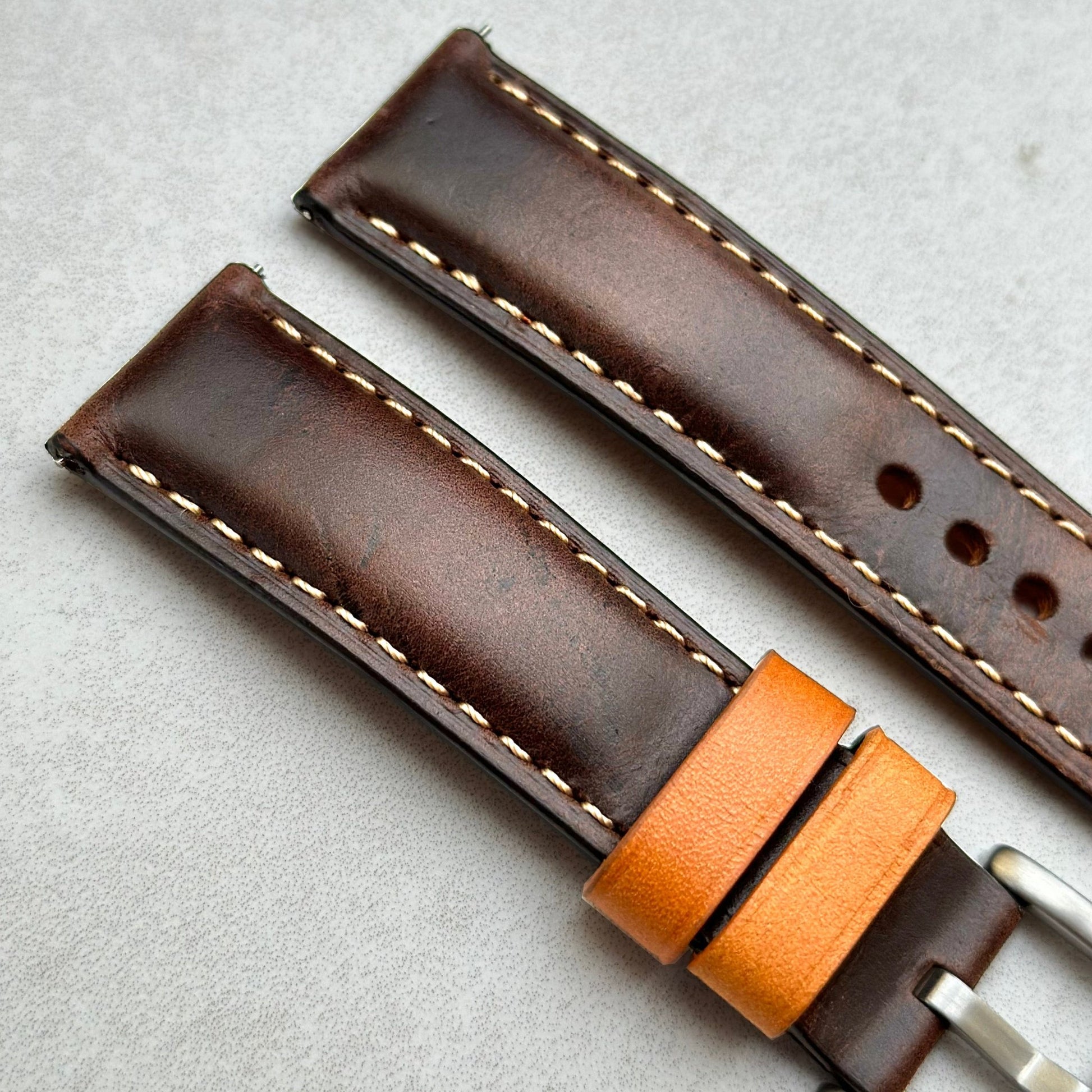 Top of the Oxford chocolate brown leather watch strap. Padded leather watch strap. Contrast ivory stitching. Watch And Strap.