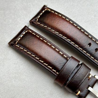 Top of the Berlin brown full grain leather watch strap. Padded leather watch strap. Contrast ivory stitching.