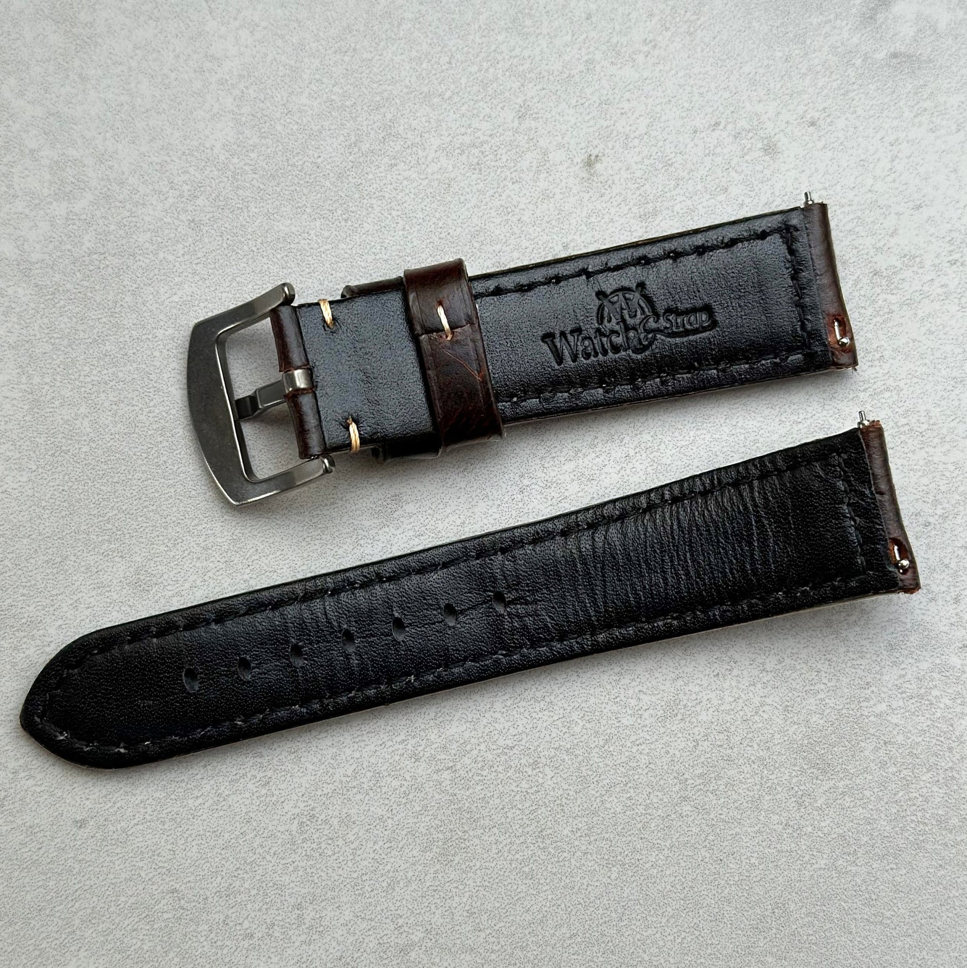 Rear of the Berlin brown full grain leather watch strap. Watch And Strap logo. Quick release pins.