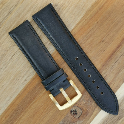 Milan black vegetable tanned leather watch strap. Fitted with a gold 316L stainless steel  buckle.