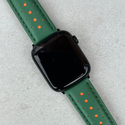 Le Mans green and orange racing apple watch strap on the Apple Watch Series 9.