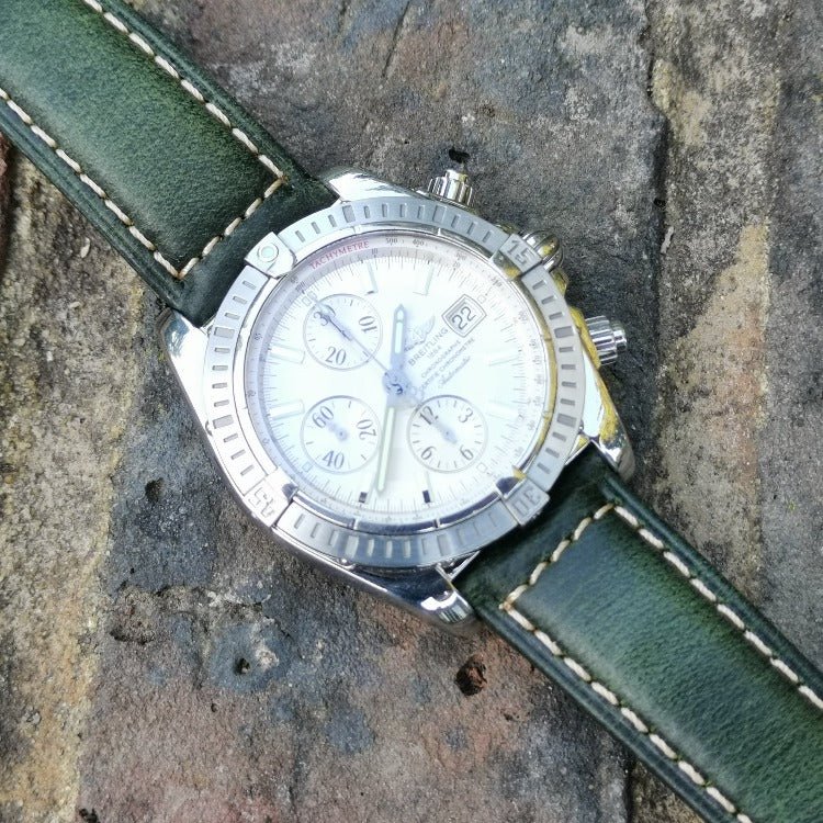 The Berlin green leather watch strap on the Breitling Evolution Chronomat. Contrast ivory stitching. Watch And Strap.