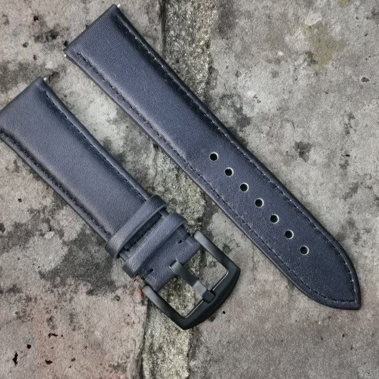 Milan black vegetable tanned leather watch strap. Fitted with a brushed black 316L stainless steel buckle.