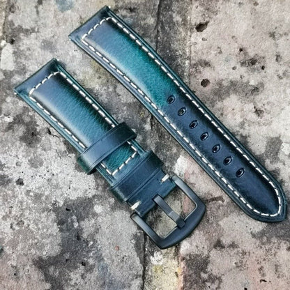 Berlin blue full grain leather watch strap. Navy blue leather with electric blue streak. Black 316L stainless steel buckle.