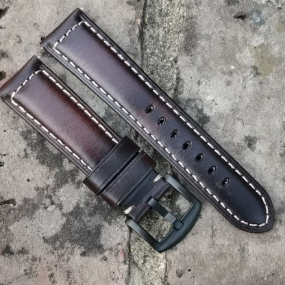 Berlin chocolate brown leather watch strap. Padded with contrast ivory stitching and a black 316L stainless steel buckle.
