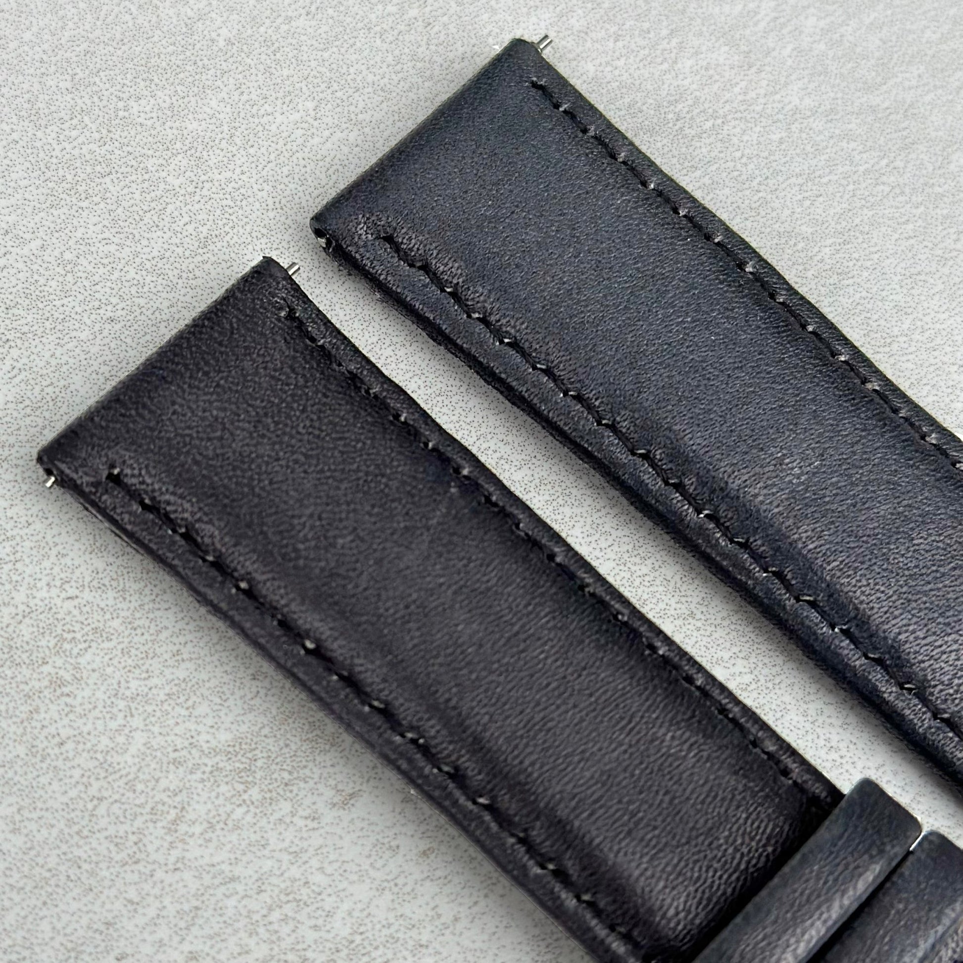 Top of the Milan black vegetable tanned leather watch strap.