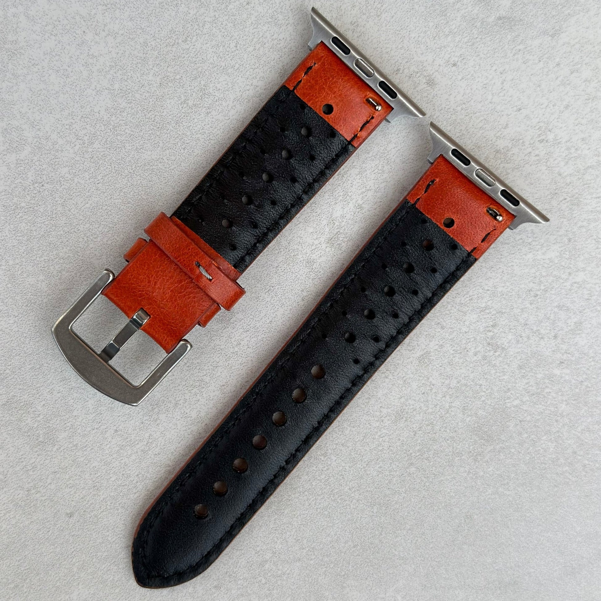 Rear of the Montecarlo orange perforated leather Apple Watch strap. Apple Watch series 3, 4, 5, 6, 7, 8, 9, SE and Ultra.