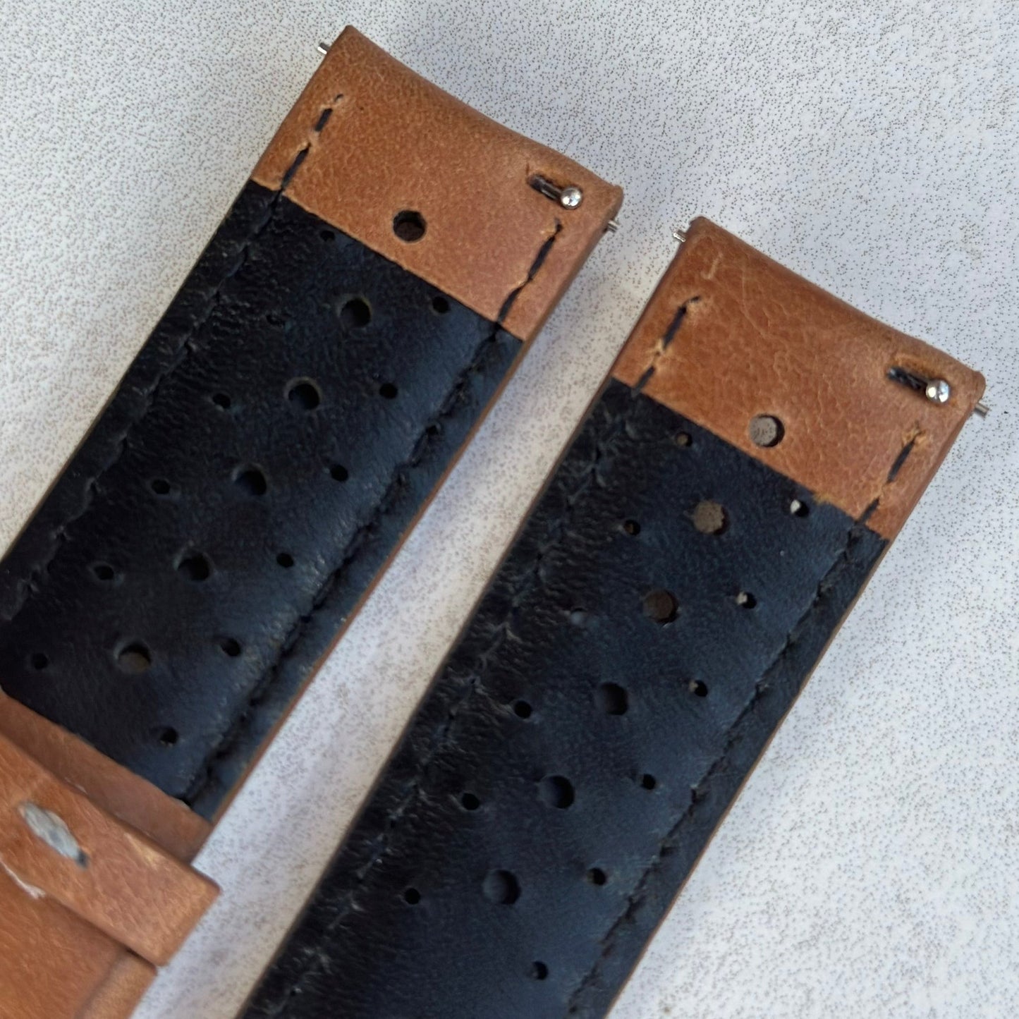 Quick release pins on the vintage tan perforated leather watch strap. Full grain leather. 18mm, 20mm, 22mm, 24mm.