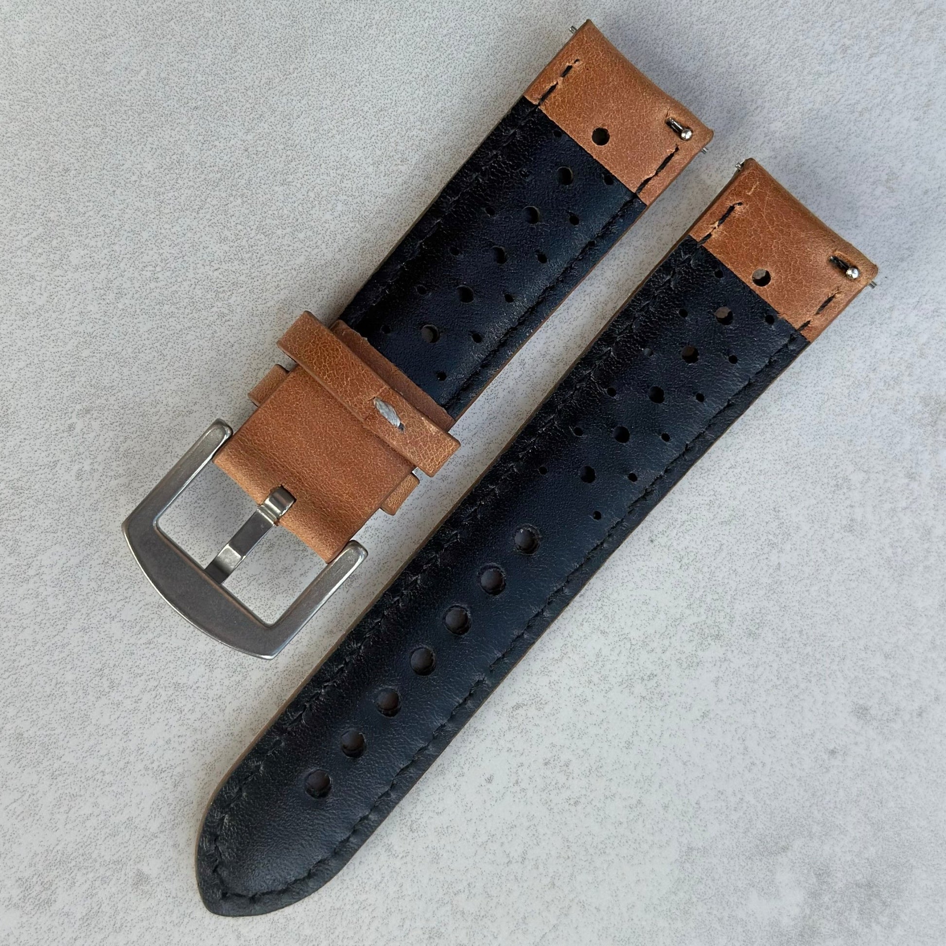 Rear of the vintage tan perforated leather rally strap. Quick release pins. Black leather. Watch And Strap.