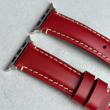 Top of the Oslo red full grain leather Apple Watch strap. Padded leather strap. Contrast ivory stitching. Watch And Strap.