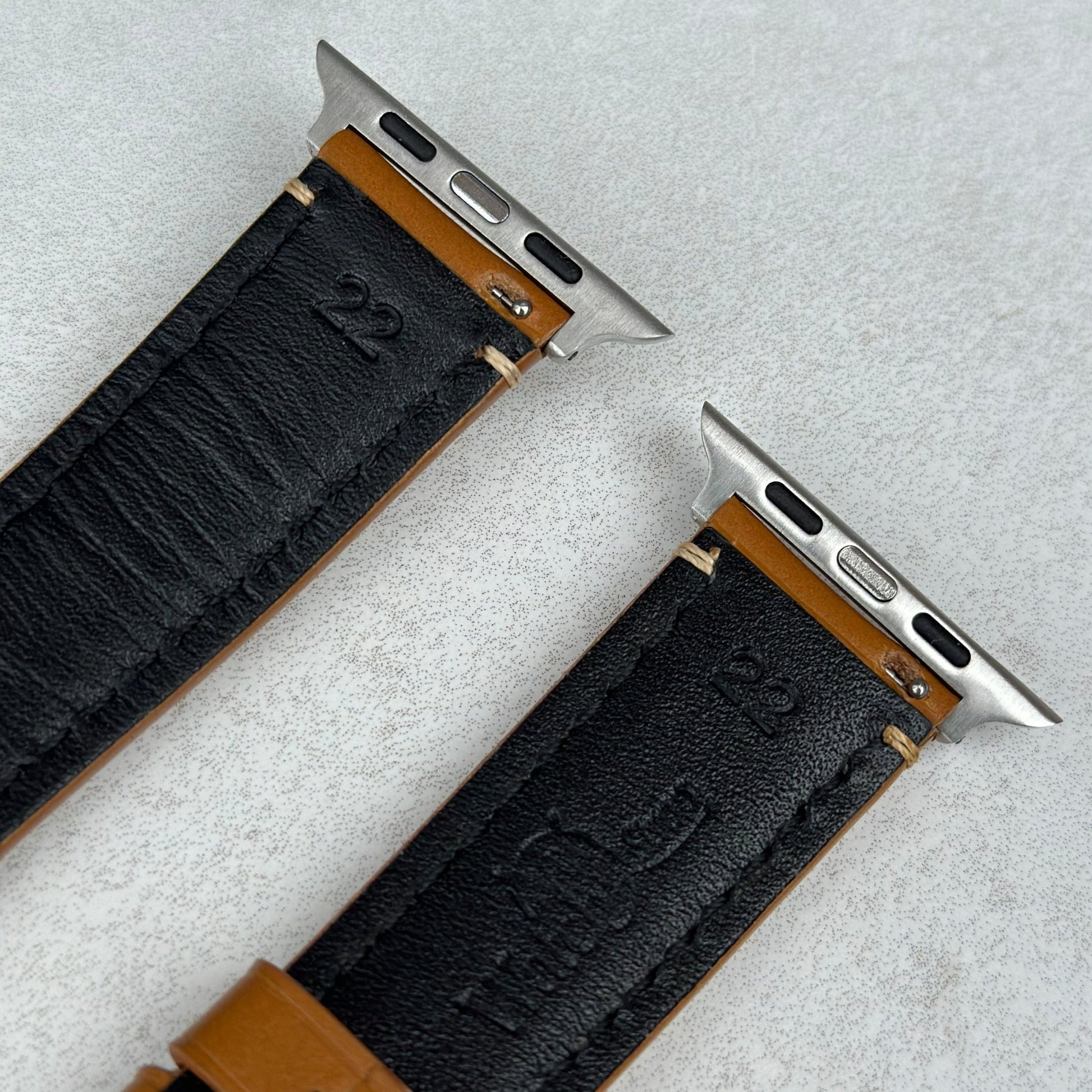 Top of the Oslo tan full grain leather Apple Watch strap. Black sweat resistant leather. Watch And Strap.