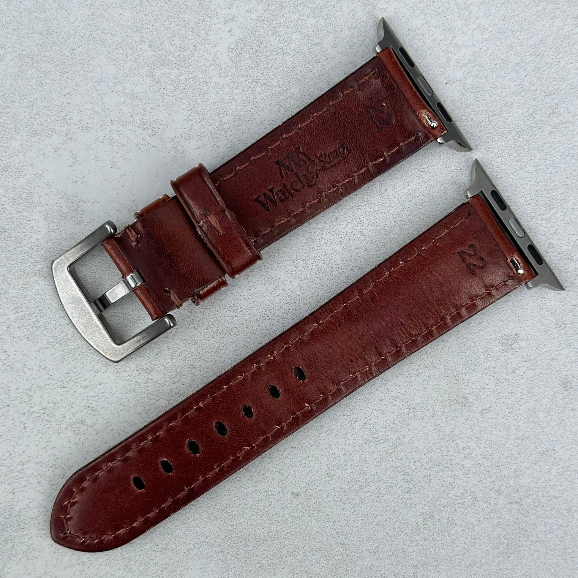 Rear of the Prague chestnut brown vegetable tanned leather Apple Watch strap. Series 3, 4, 5, 6, 7, 8, 9, SE and Ultra.