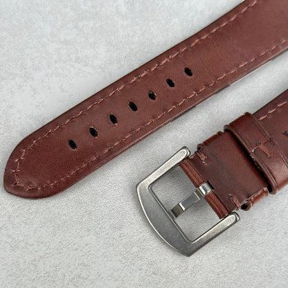 Underside of the buckle on the Prague chestnut brown vegetable tanned leather watch strap. Watch And Strap.