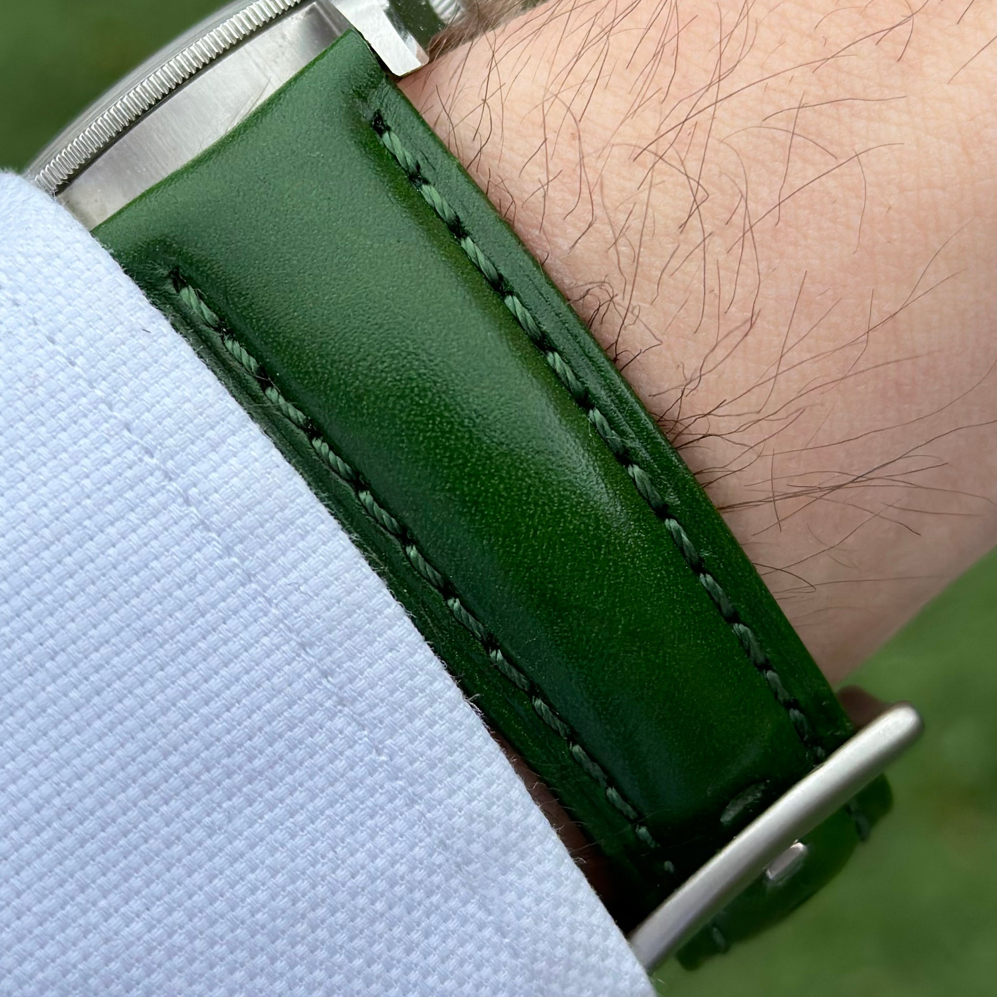 Wrist shot of the Prague racing green vegetable tanned leather watch strap on the Tudor Blackbay 58. Watch And Strap.