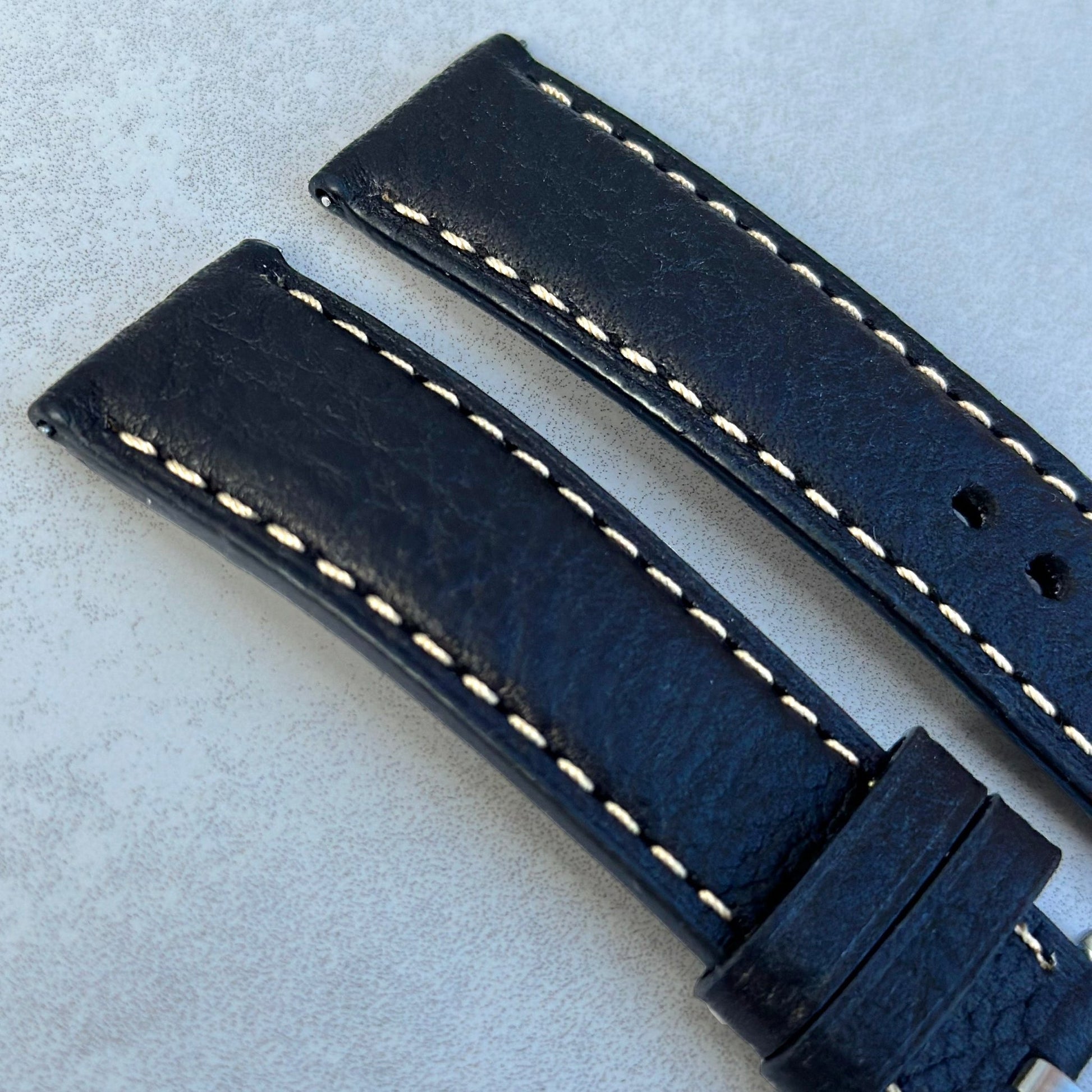 Top of the jet black Italian leather watch strap. Ivory stitching. Padded full grain leather strap. Watch And Strap