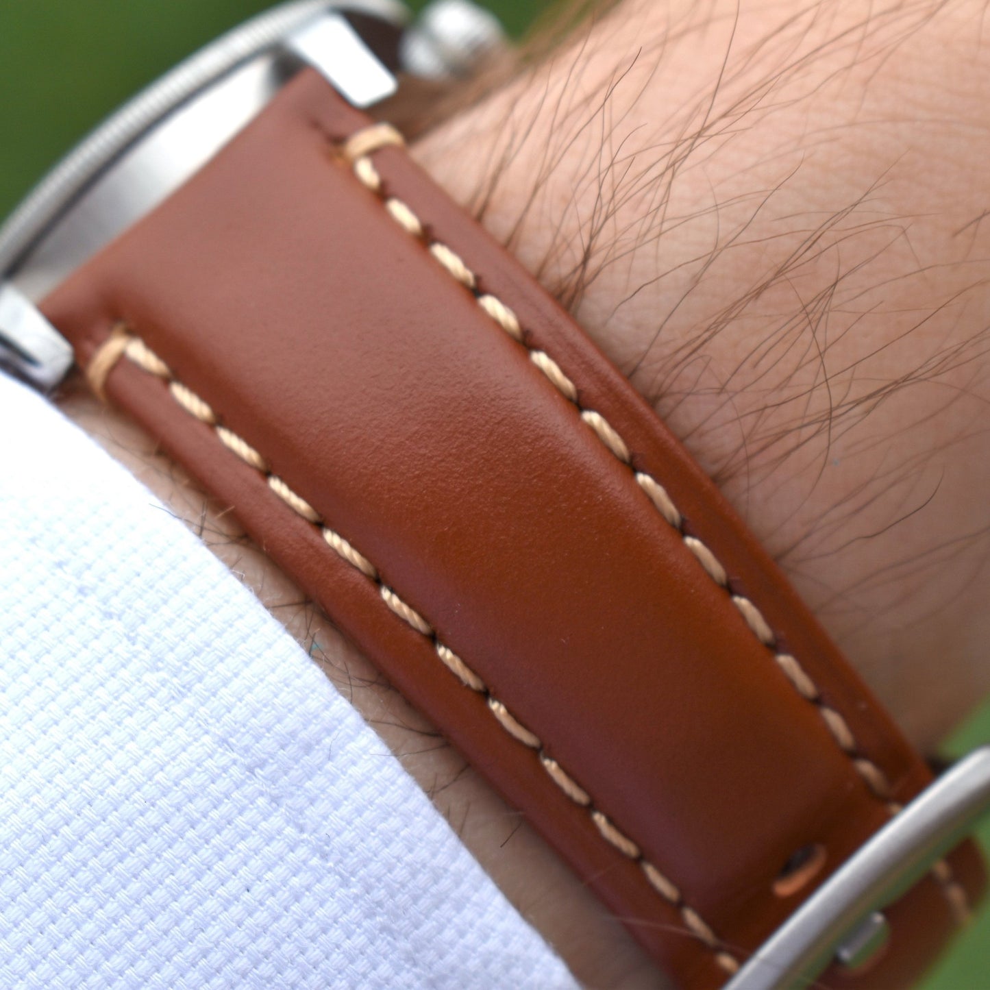 Wrist shot of the Oslo brown full grain leather apple watch.